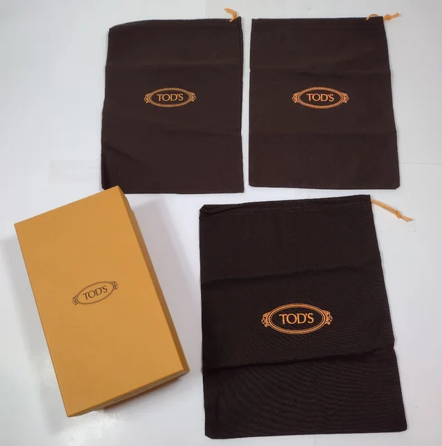Tod's Brown Dust Bags With Orange Logo And Matching Box in orange|brown|red from Poshmark, photo 1 of 1