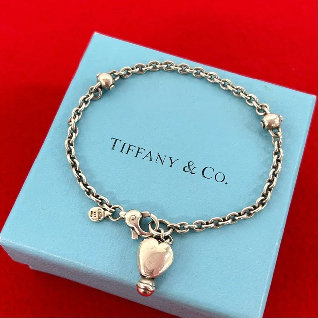 Tiffany & Co. Vintage Heart Chain Bracelet 925 Sterling Silver in Silver from The Reluxe