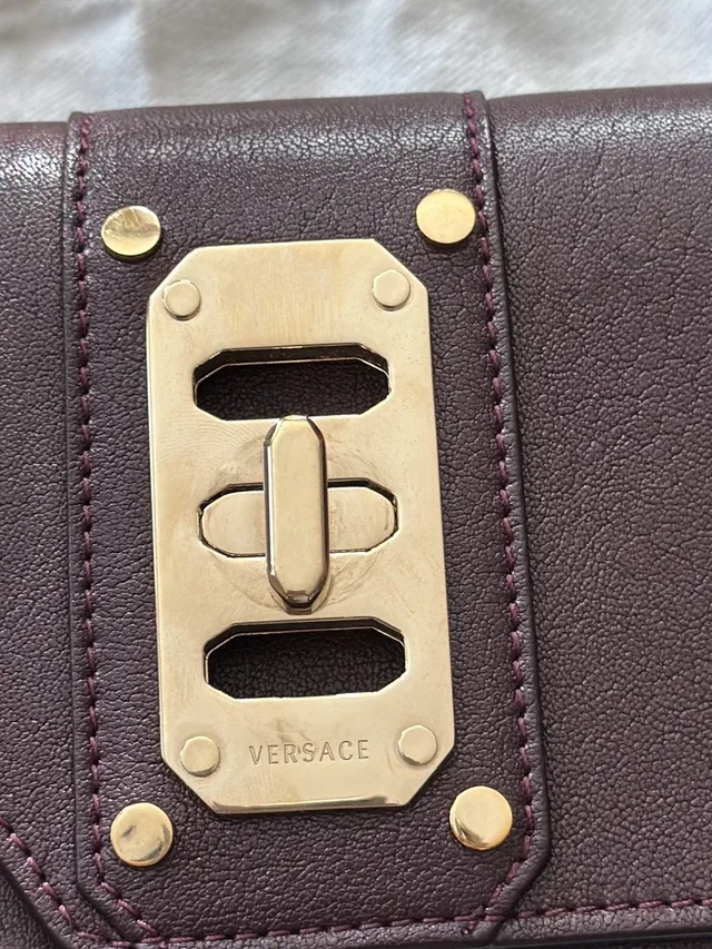 Versace Women's Plum Leather Crossbody With Gold Hardware in brown|red Leather from Poshmark