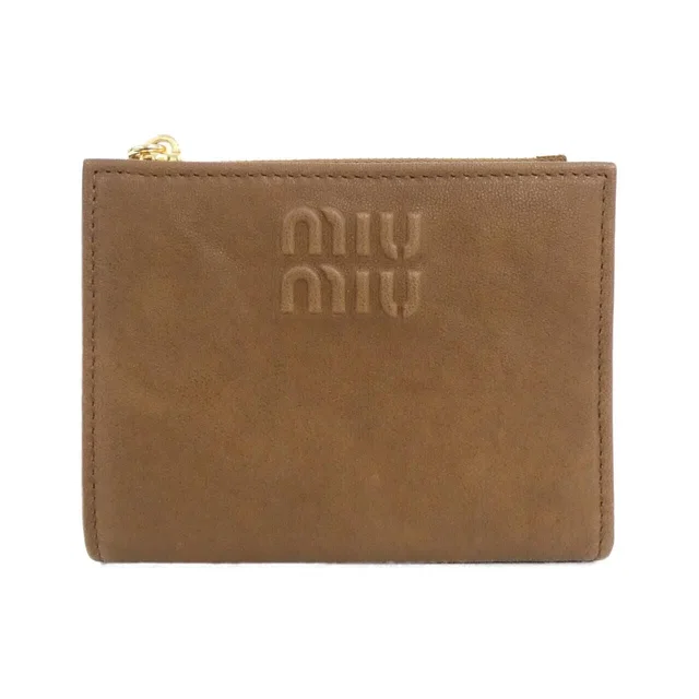 Miu Miu Wallet Gold in Gold Nappa leather from The Reluxe