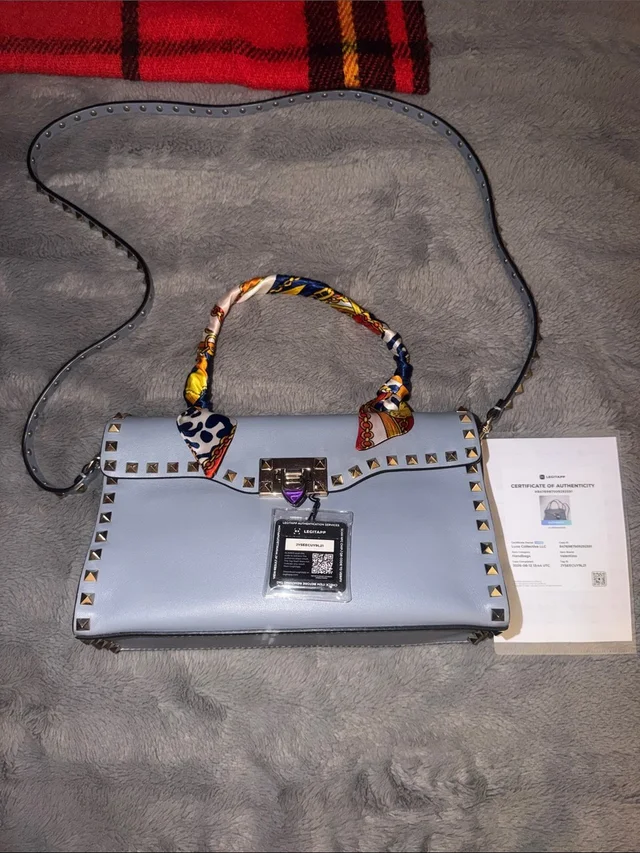 Valentino Garavani Light Blue Leather Gold Rockstud With Crossbody. in gold|blue Leather from Poshmark