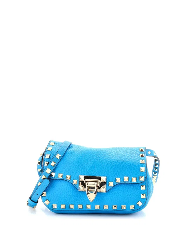 Valentino Garavani Rockstud Flip Lock #296753v69b in blue Leather from Poshmark