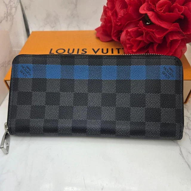 Louis Vuitton Zippy Wallet Vertical Damier Graphite Blue in Blue from The Reluxe