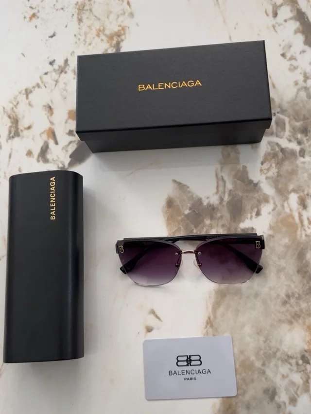 Balenciaga Rimless Sunglasses With Black Frames & Purple Gradient Lenses in black|purple from Poshmark