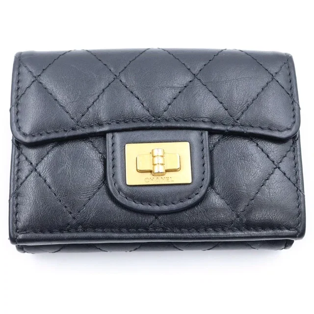 Chanel Quilted Compact Wallet Trifold Coin Purse Black Lambskin Gold in Black Lambskin from The Reluxe