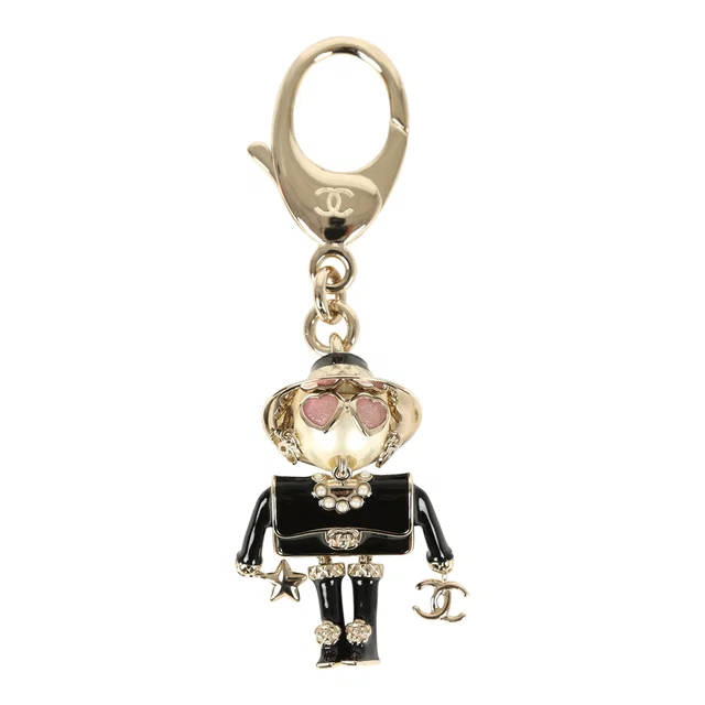 Chanel Gabrielle Doll Key Ring Black Resin & Faux Pearls Light Gold Tone Hardware in Black Resin from Madison Avenue Couture