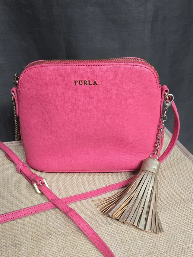 Furla Pink Crossbody With Gold Tassel Accent in gold|pink Leather from Poshmark