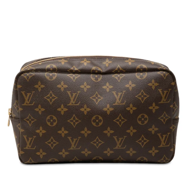 Brown Louis Vuitton Monogram Trousse Toilette 28 Clutch Bag in Brown Coated canvas from Designer Revival, photo 1 of 1