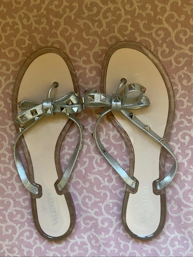 Valentino Garavani Rockstud Jelly Bow Flip Flops in gray|silver from Poshmark