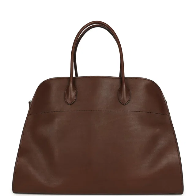 The Row Soft Margaux 17 Bag Deep Brown Saddle Silver Hardware in Brown Canvas from Madison Avenue Couture