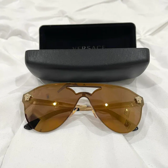 Versace Women's Sunglasses - Gold in gold from Depop, photo 1 of 1