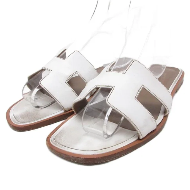 Hermès Oran Sandals Logo Leather White 36 in White Leather from The Reluxe