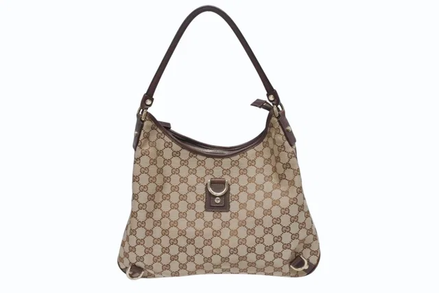 Gucci Bag Handbag GG Canvas Leather Beige Brown Gold in Brown Canvas from The Reluxe