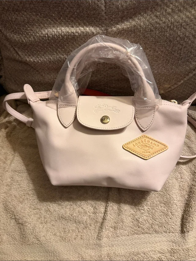 Longchamp Le Pliage Extra Xs Leather Satchel in pink Leather from Poshmark