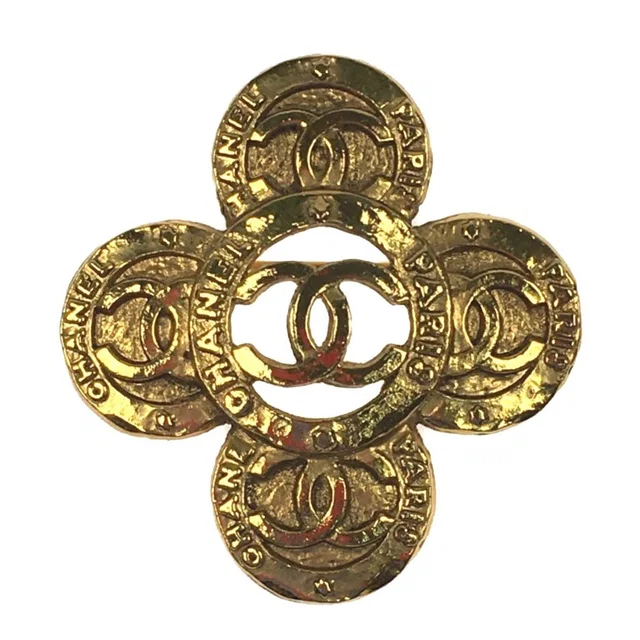 Chanel Brooch Here Mark Cross Flower from The Reluxe
