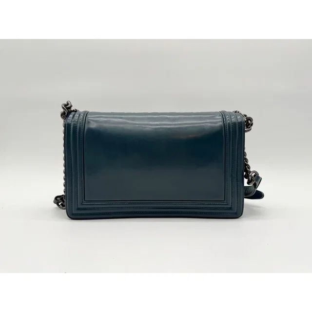 Chanel Shoulder Bag Boy CC Logo Leather With Shield Chain in Leather from The Reluxe