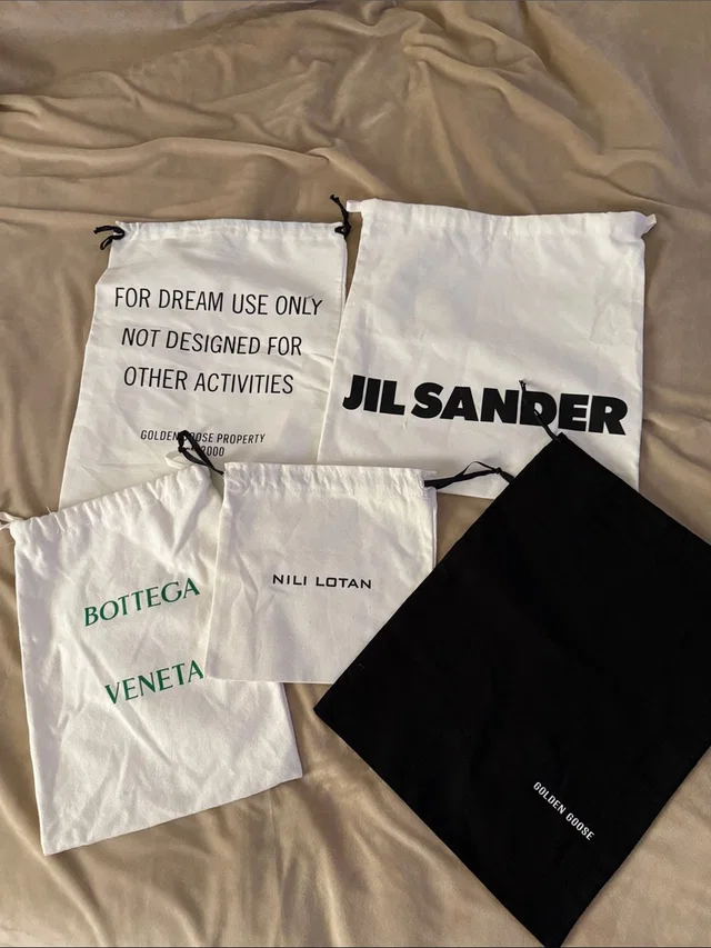 Jil Sander White And Black Branded Drawstring Dust Bags in black from Poshmark