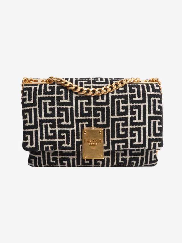 Balmain Black and neutral 1945 Soft Monogram Flap bag in Black from Sign of the Times