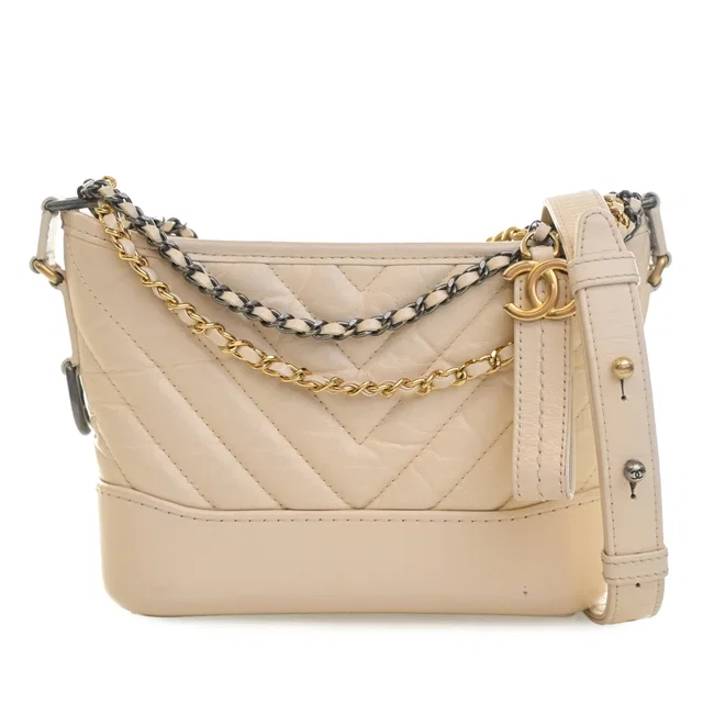 White Chanel Small Chevron Aged Calfskin Gabrielle Hobo Crossbody Bag in White Calfskin from Designer Revival