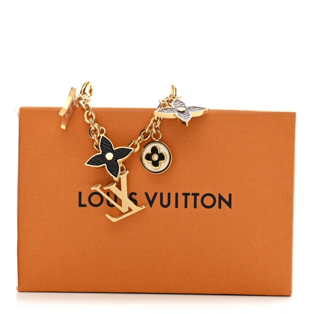 Louis Vuitton Brass Enamel Fleur De Monogram Bag Charm Chain Gold in Gold from FASHIONPHILE, photo 5 of 5
