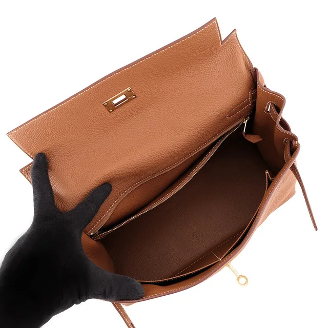 Hermès Kelly Retourne Gold Togo Leather Size 32 in Gold Togo leather from GALLERY RARE, photo 2 of 2