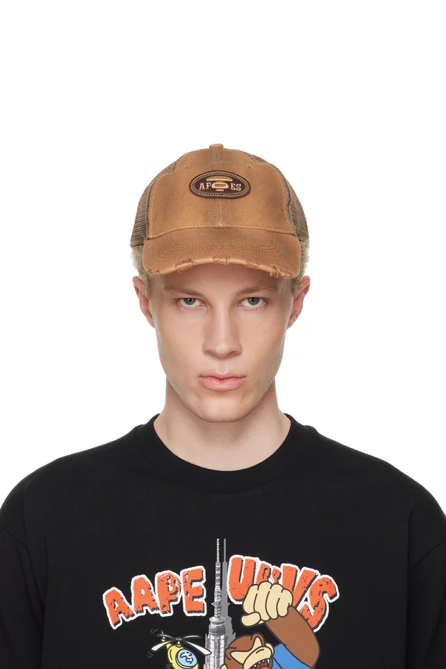 AAPE by A Bathing Ape Tan Moonface Logo Distressed Cap, image 1 of 1 from SSENSE