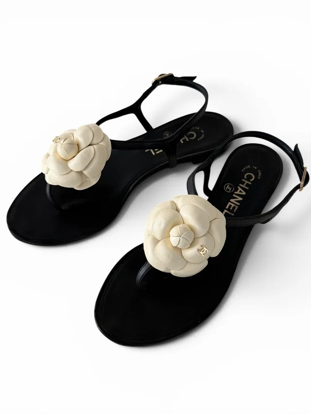 Chanel Black Leather And Cream Camellia Cc Thong Sandals / Size 38 in black|gold Leather from Poshmark