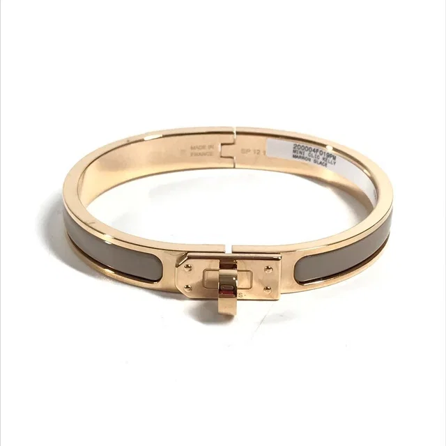 Hermès Bracelet Mini Clic Kelly PM Mini Metal Brown Glace Beige in Brown from The Reluxe