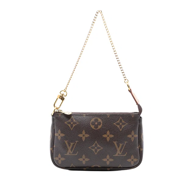 Brown Louis Vuitton Monogram Mini Pochette Accessoires Handbag in Brown Coated canvas from Designer Revival, photo 1 of 1