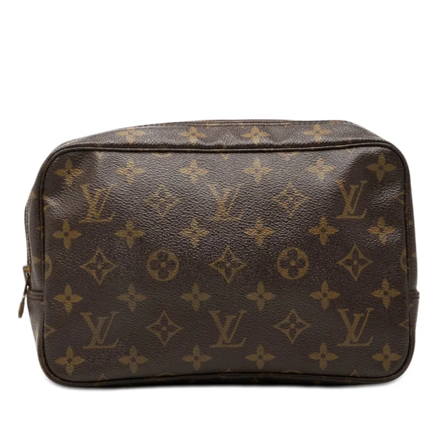 Brown Louis Vuitton Monogram Trousse Toilette 23 Clutch Bag in Brown Coated canvas from Designer Revival, photo 1 of 1