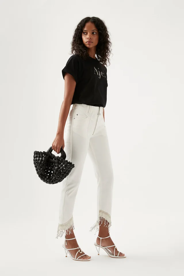 AJE Sheen Fringe Denim Jeans in White from Aje, photo 1 of 1