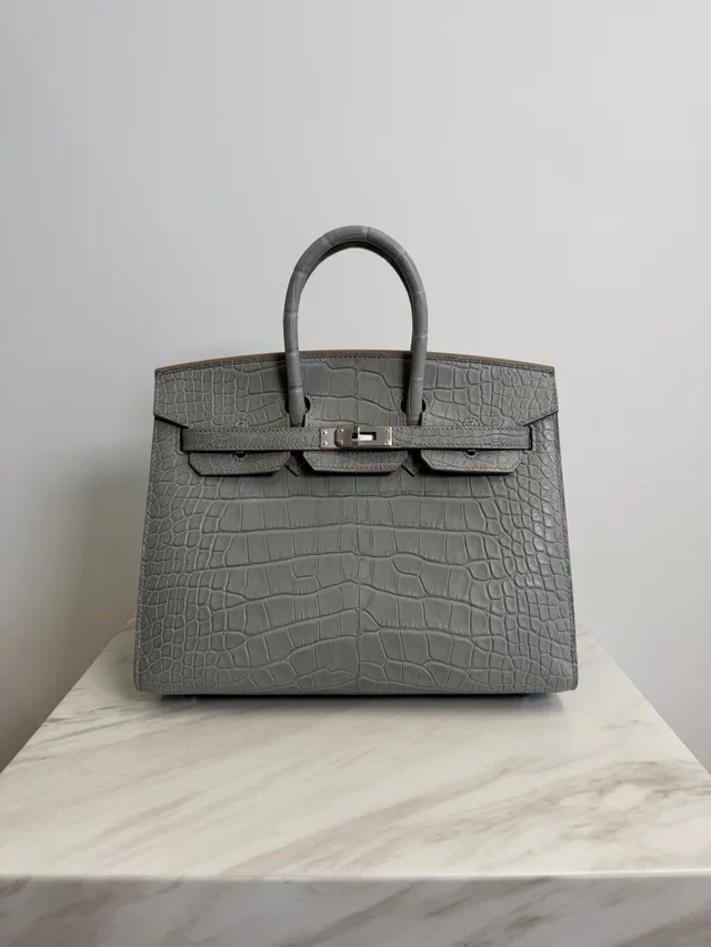 Hermès Birkin 25 Gris Perle Matt Alligator Palladium Hardware in Grey Crocodile from Luxury Promise