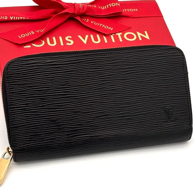 Louis Vuitton Wallet Black Gold Zippy Epi in Black from The Reluxe