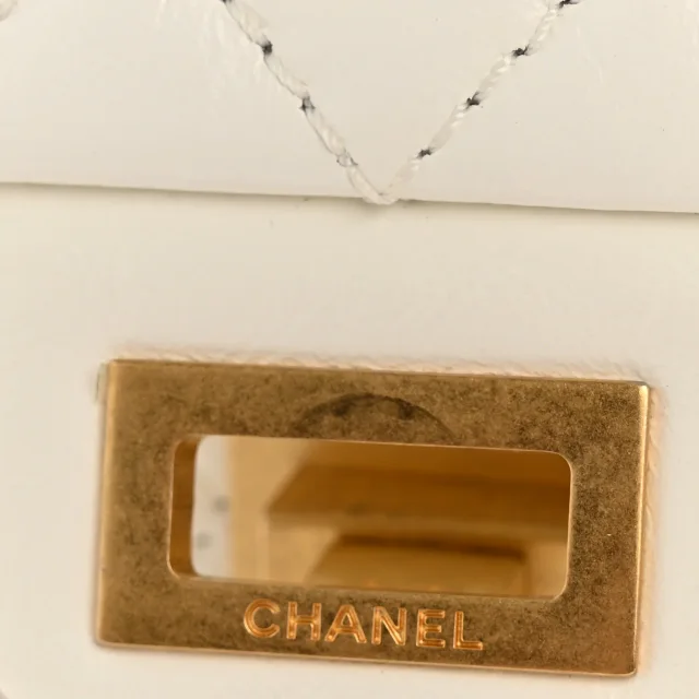 Chanel Aged Calfskin Quilted 2.55 Reissue Mini Flap White in White Calfskin from FASHIONPHILE, photo 12 of 14