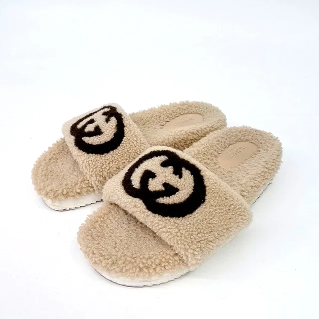 Gucci fur slippers from GUGUS