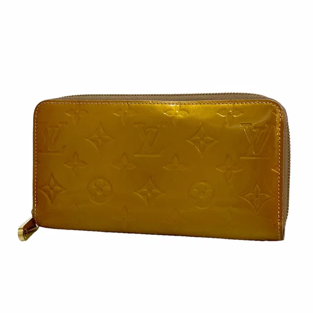 Louis Vuitton Wallet Vernis Zippy Beige Poodle in Beige from The Reluxe