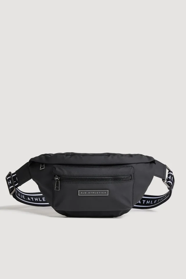 Athletica Essential Logo Crossbody 973 in Black from Aje, photo 1 of 1