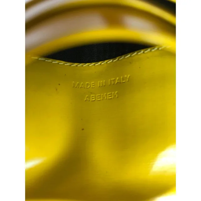 Bvlgari Women's Wallets - Black/Yellow in yellow|black from Depop, photo 7 of 9