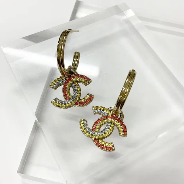 Chanel Earrings CC Logo Hoop Rhinestone Gold Multicolor in Gold from The Reluxe