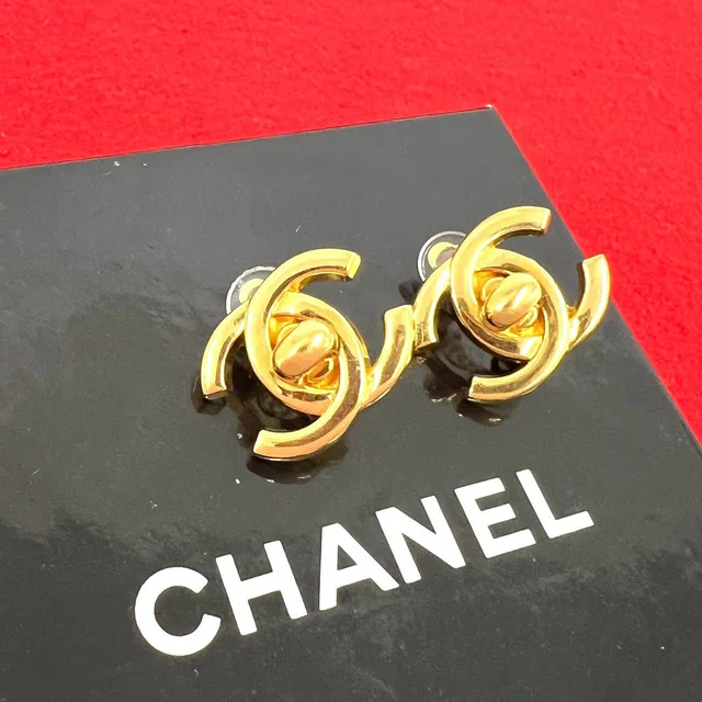 Chanel With Rice 95A Vintage CC Logo Turnlock Motif Earrings Gold in Gold from The Reluxe