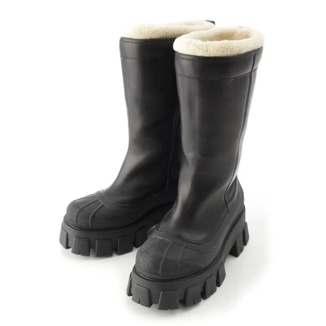 Prada Monolith Shearling Logo Thick Sole Long Boots Black in Black from The Reluxe