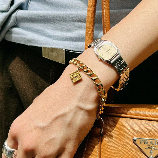 Givenchy Logo Plate Bracelet Gold in Gold from VINTAGE QOO TOKYO