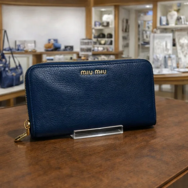 Miu Miu Leather Zip-Around Wallet in blue Leather from Poshmark