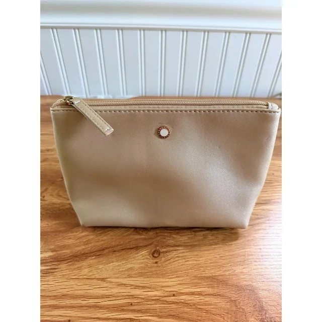 Bvlgari Women's Makeup and toiletry bags - Gold/Cream in gold from Depop, photo 1 of 1