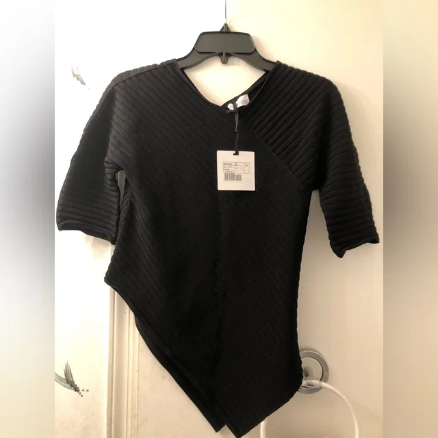 REDValentino Top Xs in black from Poshmark