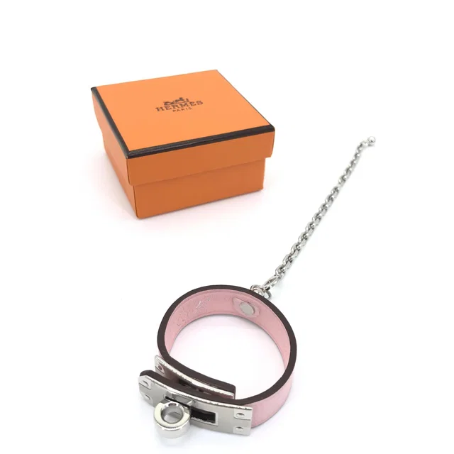 Hermès Rose Sakura Swift Leather Micro Kelly glove holder in Pink Swift leather from Luxury Promise