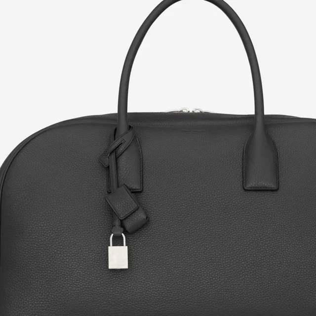 Saint Laurent Hammered Calfskin Top Handle Bag — Black Leather in Black Calfskin from HEWI