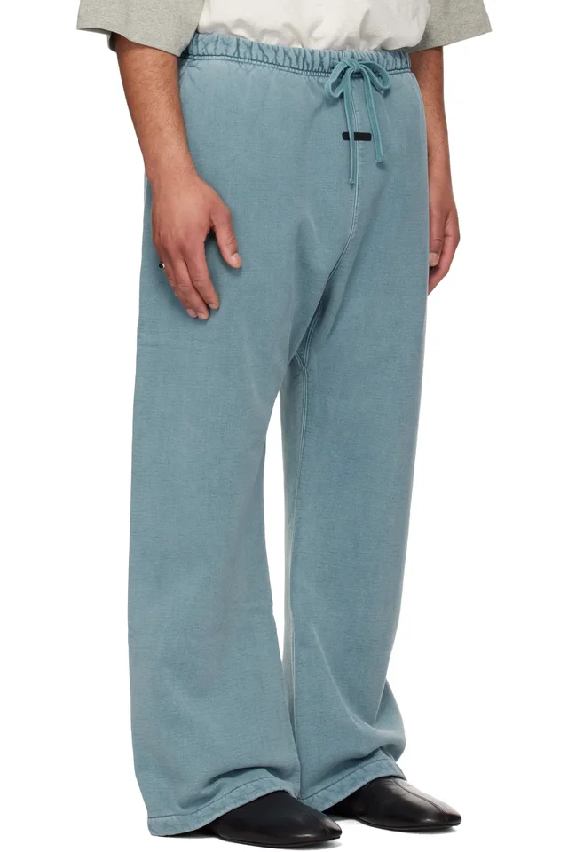 Fear of God ESSENTIALS Blue Signature Classic Flare Sweatpants, photo 2 of 4 from SSENSE