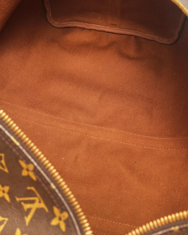 Louis Vuitton Monogram Keepall Bandoulière 60 Weekend Bag in Coated canvas from A Retro Tale, photo 11 of 12