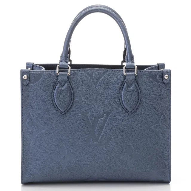 Louis Vuitton On The Go PM Monogram Empreinte Metallic Blue Shoulder Bag in Blue from The Reluxe